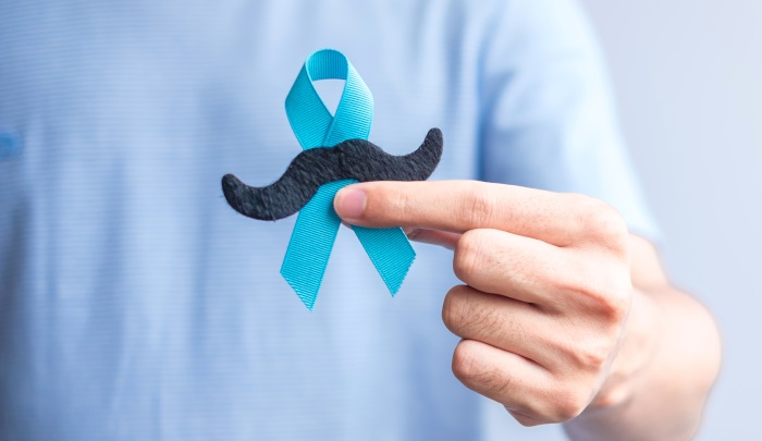 November Prostate Cancer Awareness month, Blue Ribbon with musta